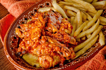 Spicy Pineapple Glazed Boneless Chicken Wings with French Fries