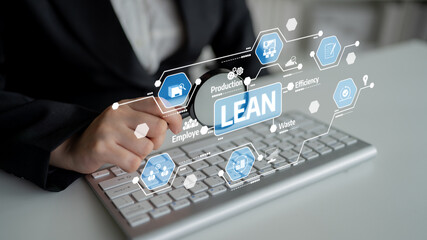 Business Professional Using Keyboard with Lean Manufacturing Concept and Technology Icons Illustrating Efficiency and Productivity in the Workplace. Tessel.