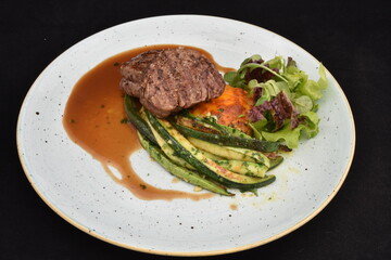 Filet Mignon is a steak cut from the narrowest section of the beef loin, also known as the 