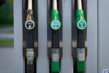 Fuel pumps with diesel and 95 and 100 E10 E5 green hoses © Holger