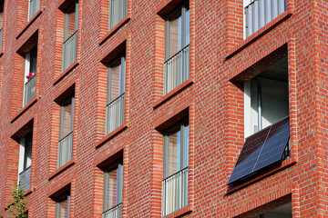 Large brick home balcony sides equipped with solar modules, german balcony power plant