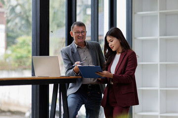 Fototapeta premium Business people, tablet and finance meeting in portrait, teamwork and online for brainstorming budget. Employees, discussion and website for income statement in workplace, planning and accounting 