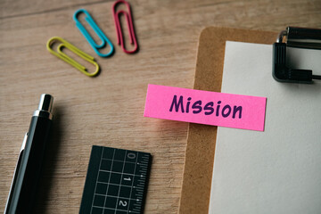 There is sticky note with the word Mission. It is as an eye-catching image.