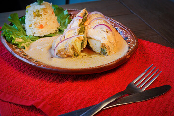 Gourmet Creamy Stuffed Poblano Peppers with a Side of Mexican Rice