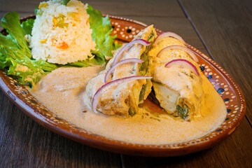 Gourmet Creamy Stuffed Poblano Peppers with a Side of Mexican Rice