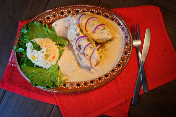 Gourmet Creamy Stuffed Poblano Peppers with a Side of Mexican Rice