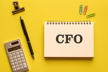There is notebook with the word CFO. It is an abbreviation for Chief Financial Officer as eye-catching image.