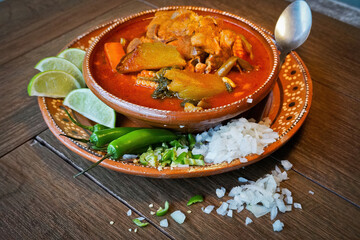 Hearty Mexican Pork and Vegetable Stew (Mole de Olla) in a Clay Bowl