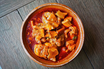 Hearty Mexican Pork and Vegetable Stew (Mole de Olla) in a Clay Bowl