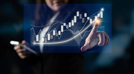 A professional examines stock market trends using interactive technology, showcasing financial...