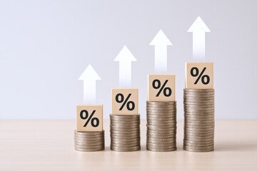 Interest Rate Increase Concept with Coin Stacks and Percentage Sign Blocks Showing Financial Growth