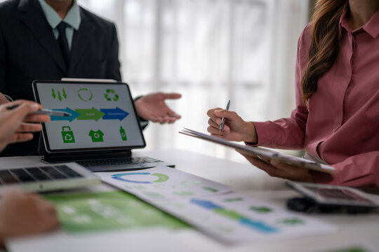 Business team discussing sustainability and circular economy strategy