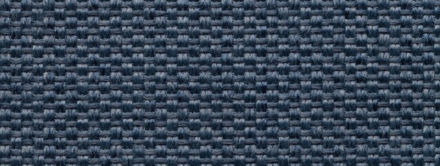 Navy blue woven textile macro texture background. Knitted denim fabric pattern for material design and backdrop