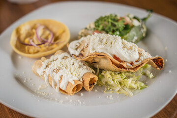 Traditional Mexican Appetizer Platter (Botana) with a Chalupa and Chile Capon