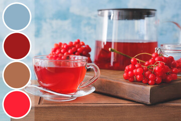 Cup of healthy viburnum tea on table