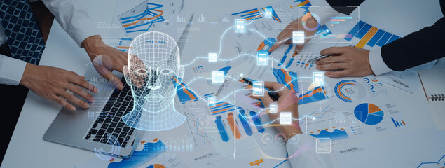 A dynamic business team collaborates to analyze marketing data using modern technology, featuring charts and futuristic visuals on a workspace, focusing on analytics and strategic insights. Trope