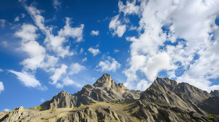 Mountain peaks under blue sky