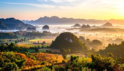 Sunrise over a misty valley landscape
