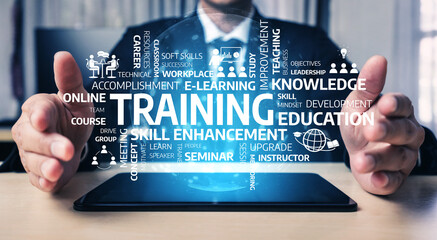 A modern digital scene showing a person hands holding a tablet displaying various training and education keywords, emphasizing skill enhancement and professional growth. Tessel