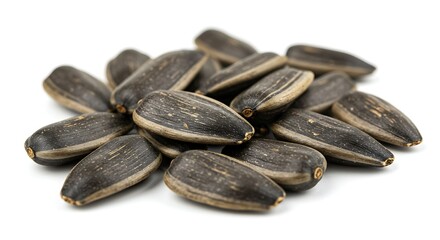 Pile of Dark Striped Sunflower Seeds Isolated on White Surface Close-up