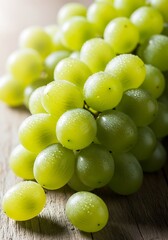 Freshly harvested green grapes glistening with moisture evoking a sense of natural sweetness and orchard freshness