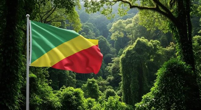 Republic of the congo flag waving gently against a backdrop of dense green rainforest