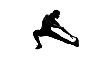 A solitary figure in silhouette illuminated by a single light source conveying a sense of introspection and mystery in the darkness