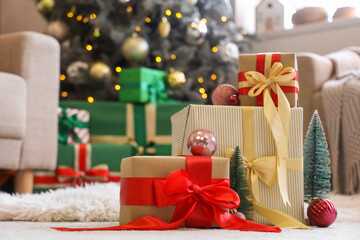 Christmas gift boxes on floor in living room