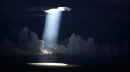 Obraz premium darkness. Beam of sunlight breaking through dark storm clouds, illuminating the ground. travel magazines, destination branding, designed for outdoor magazines and nature guides.