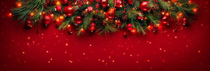 Christmas red ball with fir branches on festive background. © Lily