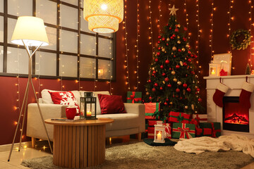 Interior of living room with sofa, glowing lights and Christmas tree