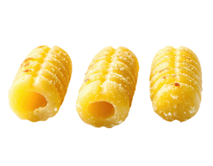 Three pieces of pasta, a light golden color,  with a ridged texture