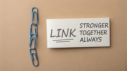 Obraz premium Blue Paper Clips with Inspirational Quote about Connection and Unity for Office or Classroom Motivational Decor