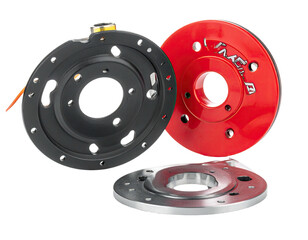 Close-up of three circular parts, two dark gray and one red, overlapping