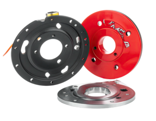 Close-up of three circular parts, two dark gray and one red, overlapping