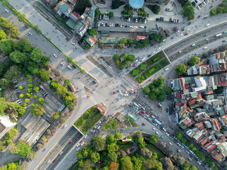 Wide aerial view of Le Duan - Dai Co Viet intersection in Hanoi surrounded by greenery and buildings.