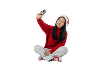 Young woman snaps a holiday selfie, isolated, PNG