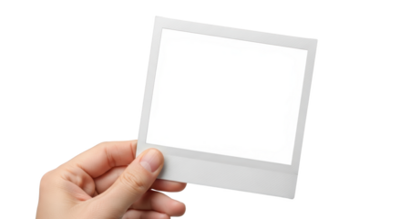 Hand holding a blank instant photo frame isolated on white background featuring hand, holding, instant, photo,