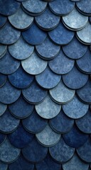 Close-up view of overlapping, circular, textured scales in varying shades of deep blue