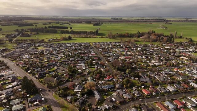Geraldine town in New Zealand during sunset, Canterbury region, aerial shot