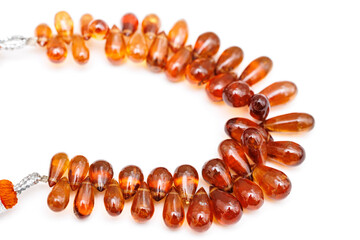 Hessonite Garnet Faceted Briolette Beads on White