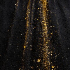Dark backdrop with golden glitter streaks