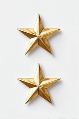 Obraz premium Two gold, five-pointed stars isolated on white, slightly angled, with metallic sheen