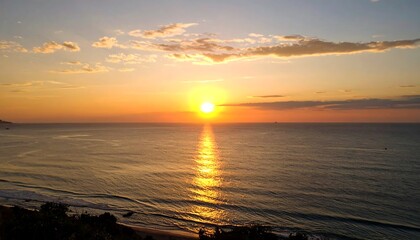 Sunrise over calm ocean