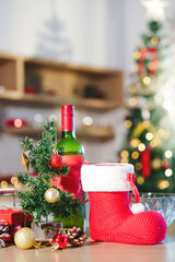 Christmas Decor with Red Stocking and Wine Bottle