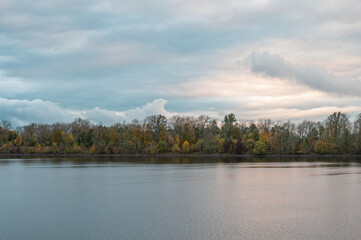 Picturesque sunset over the river in autumn.
