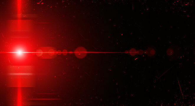 Abstract red light flare effect on dark background, creating dynamic visuals