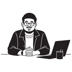 Man sitting at desk with laptop and notebook.