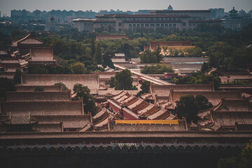 An aerial view of The Palace Museum in Beijing. The ancient complex of red-roofed buildings, a...