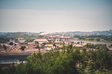 A daytime vista offers a scenic view of the Palace Museum in Beijing, showcasing ancient...